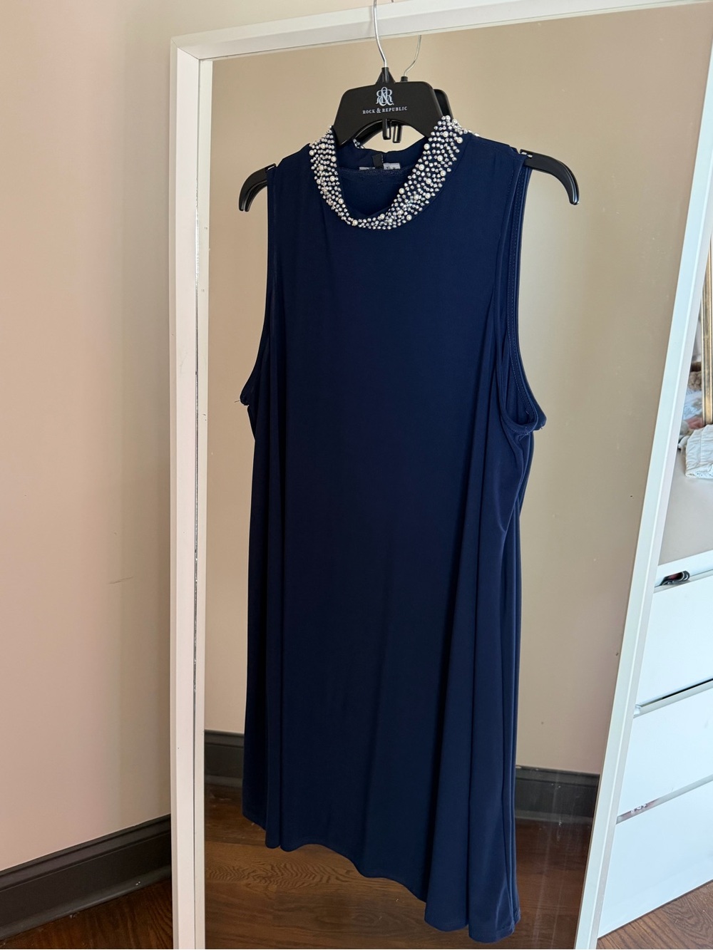 Navy dress with rhinestones and pearls